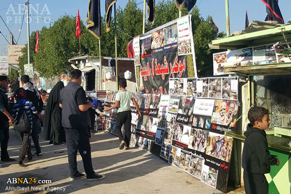 تقرير مصور/ معرض صور لجرائم آل سعود في طريق بين النجف الاشرف وكربلاء المقدسة